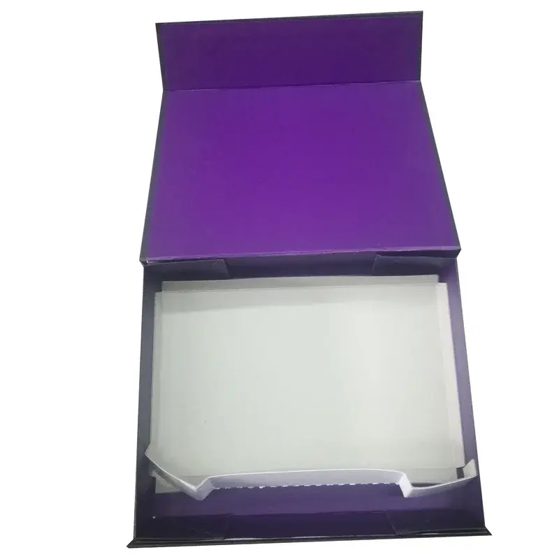 Open purple presentation box with a white fitted insert.