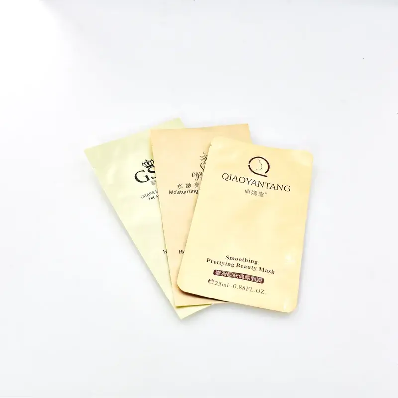 Overlapping beige flat pouches with dark printed lettering.