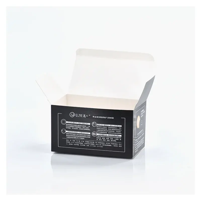 Black printed carton with its white top flaps opened.