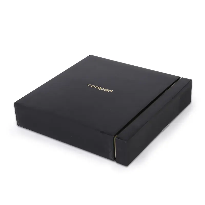 Closed black rectangular drawer box with small gold lettering.