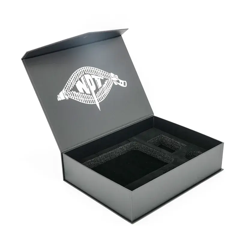 Open black presentation box with a recessed dark insert.