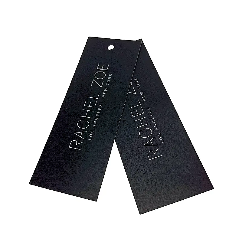 Black folded hanging tag with pale printed lettering.