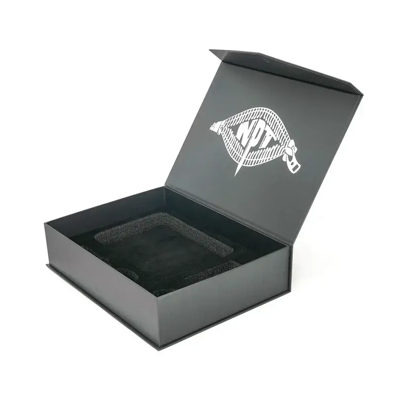Open black gift box with a dark recessed insert.