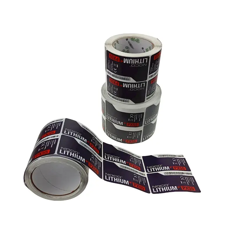 Black printed label rolls with one roll partly unwound.