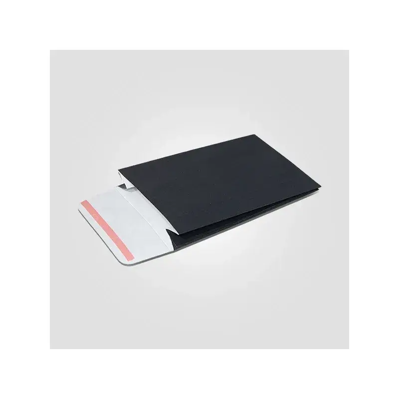 Black mailing envelope with a white adhesive flap extended.