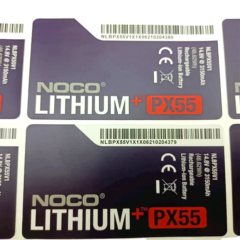 Close view of printed black and purple product labels.