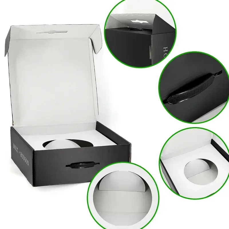 Open black and white box with inset views of its folded details.