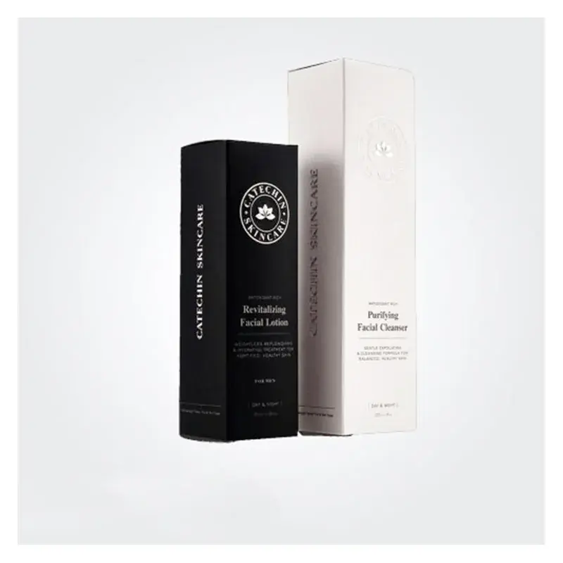 Black and white tall cartons with fine printed lettering.