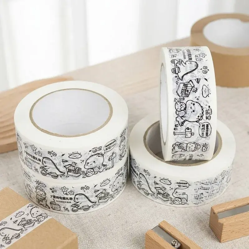 White tape rolls with repeating black illustrations.
