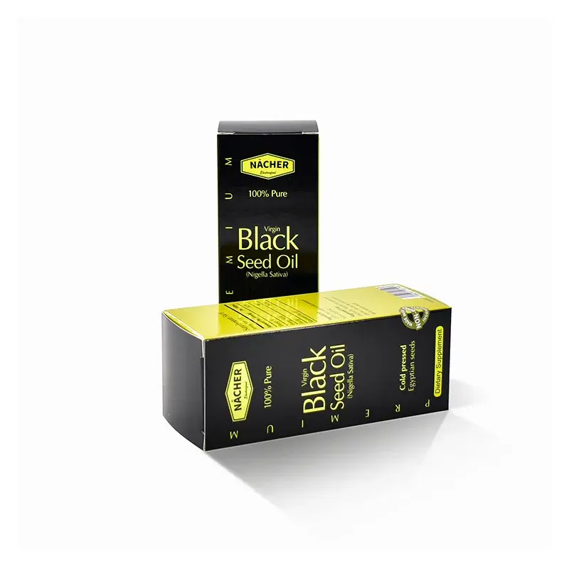 Black and yellow oil cartons displayed upright and horizontally.