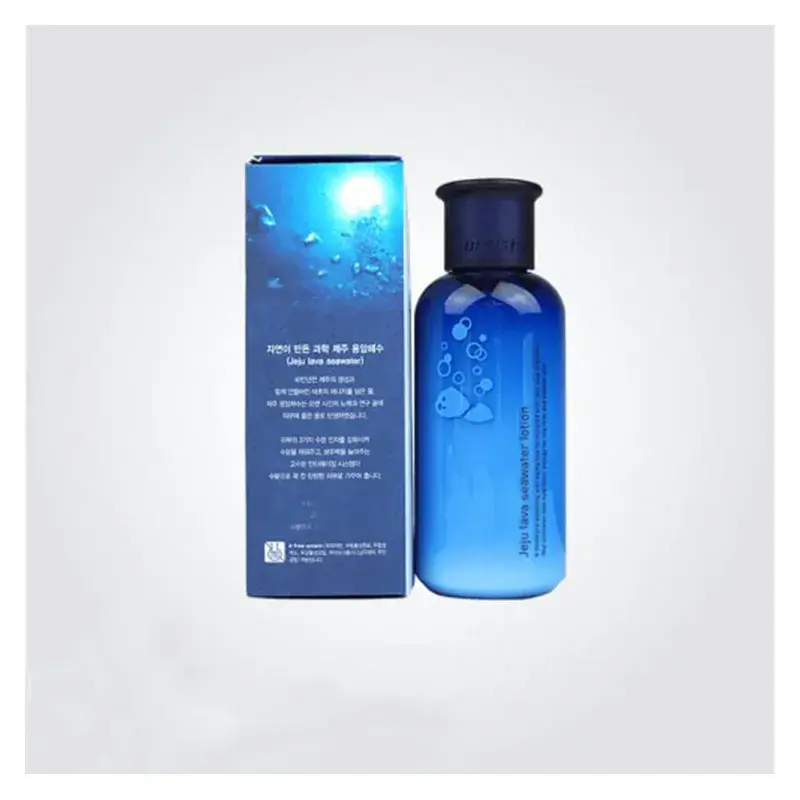 Blue cosmetic bottle beside a matching blue printed carton.