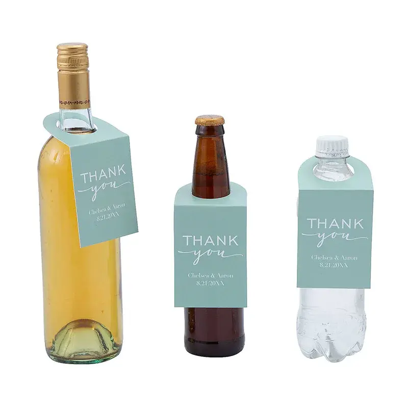 Three different bottles with pale blue printed neck tags.