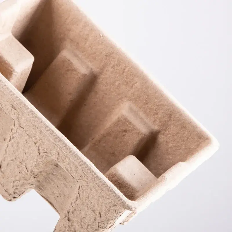 Close view of a brown textured tray with raised partitions.