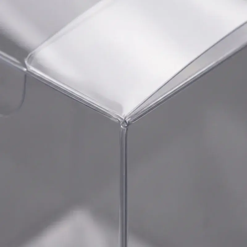 Close view of the folded corner of a transparent box.