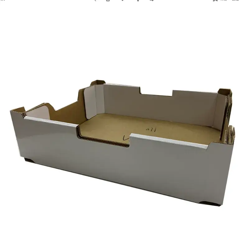 Empty gray cardboard tray with shaped raised corners.