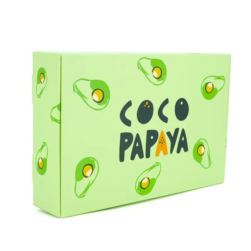Closed green box with avocado graphics and black lettering.