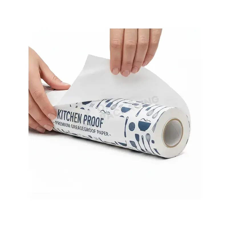 Hands unrolling white printed paper from a wide roll.