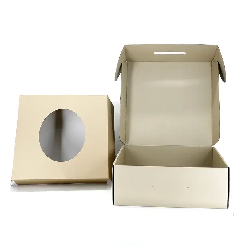 Open kraft box beside its circular-cutout cardboard insert.