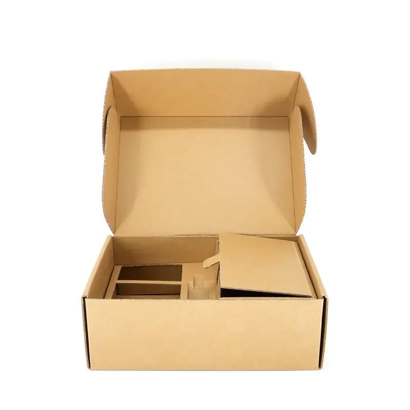 Open kraft box with divided compartments and a covered section.