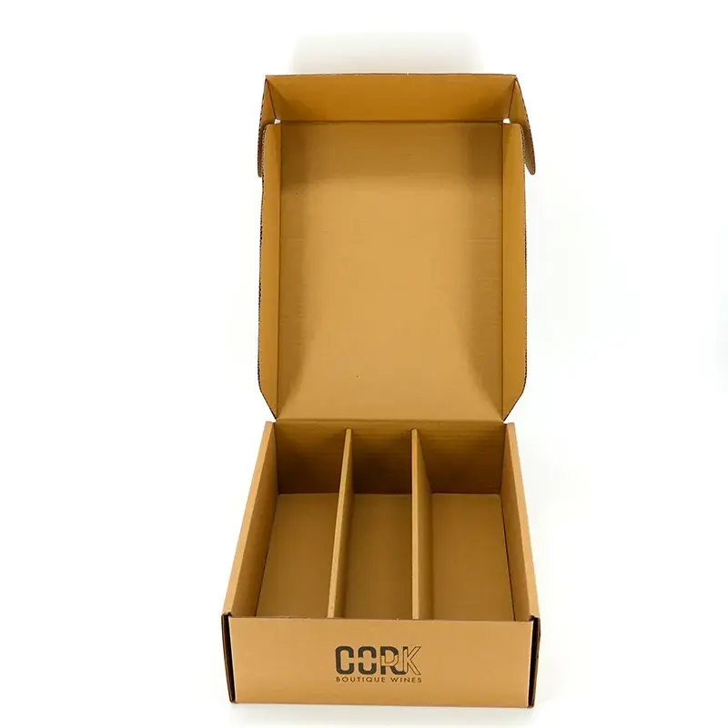 Open kraft box viewed from above with three long compartments.