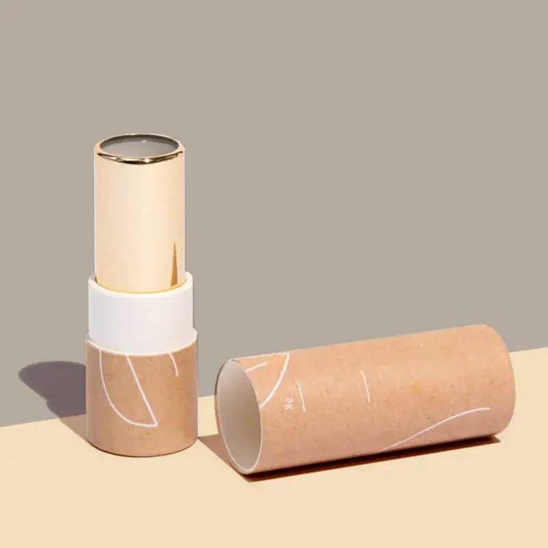 Kraft tube with a pale stick raised above its rim and a loose cap.