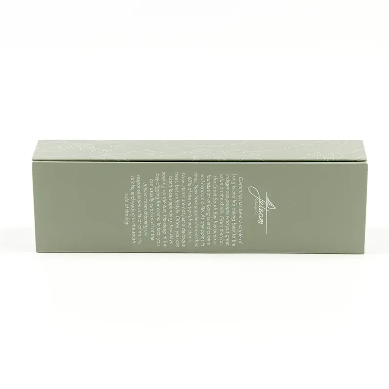 Long green box with small white lettering on its surface.