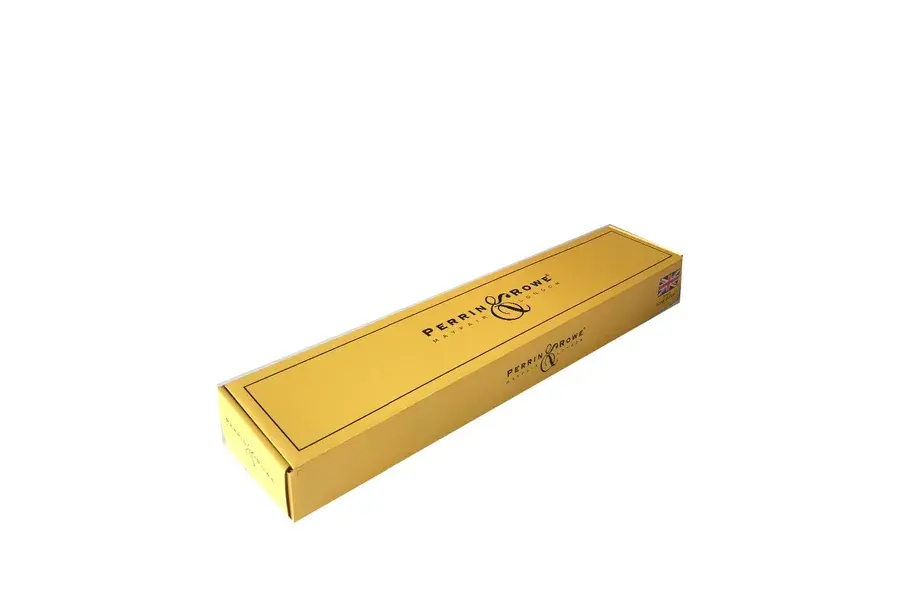 Closed long yellow carton with dark printed lettering.
