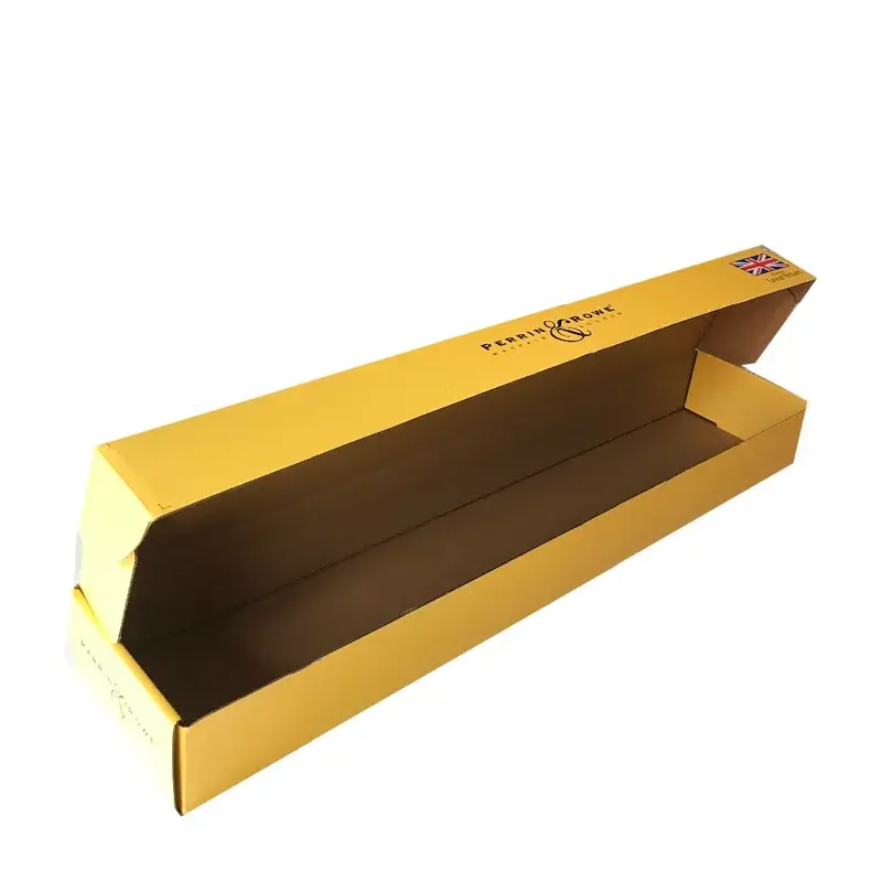 Angled view of a long yellow carton with its lid raised.