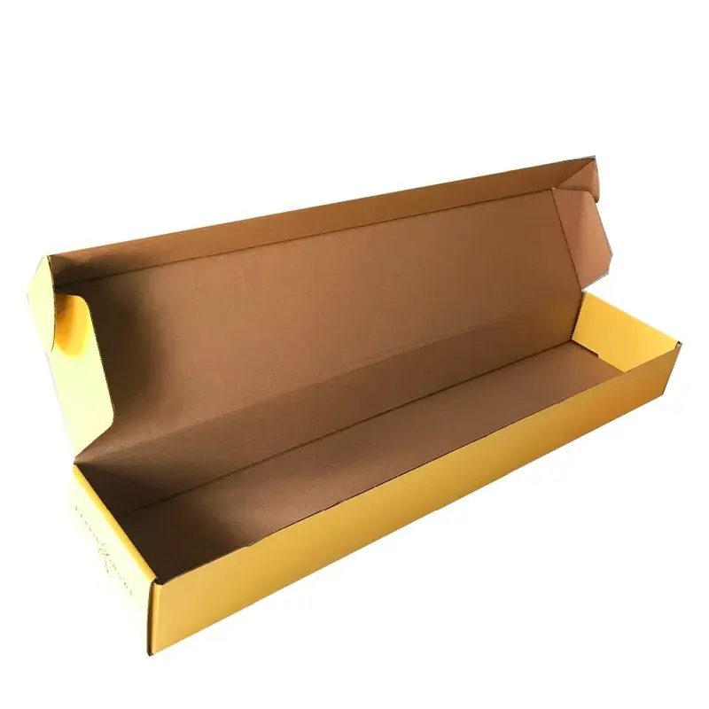 Long yellow carton with its lid opened above a brown interior.