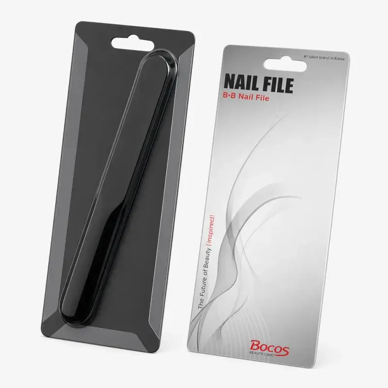 Nail files packaged on black and white hanging display cards.