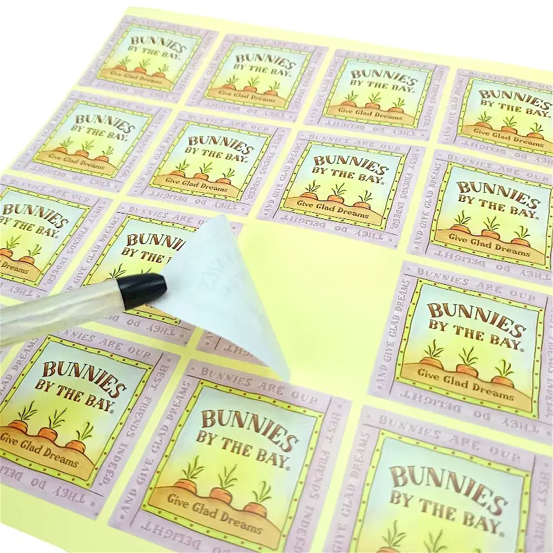 Pastel square label sheet with one corner being peeled back.
