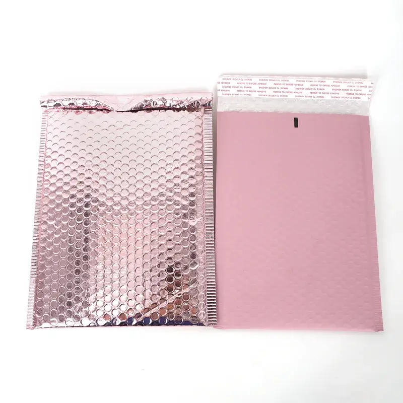 Two pink bubble mailers showing shiny and plain surfaces.