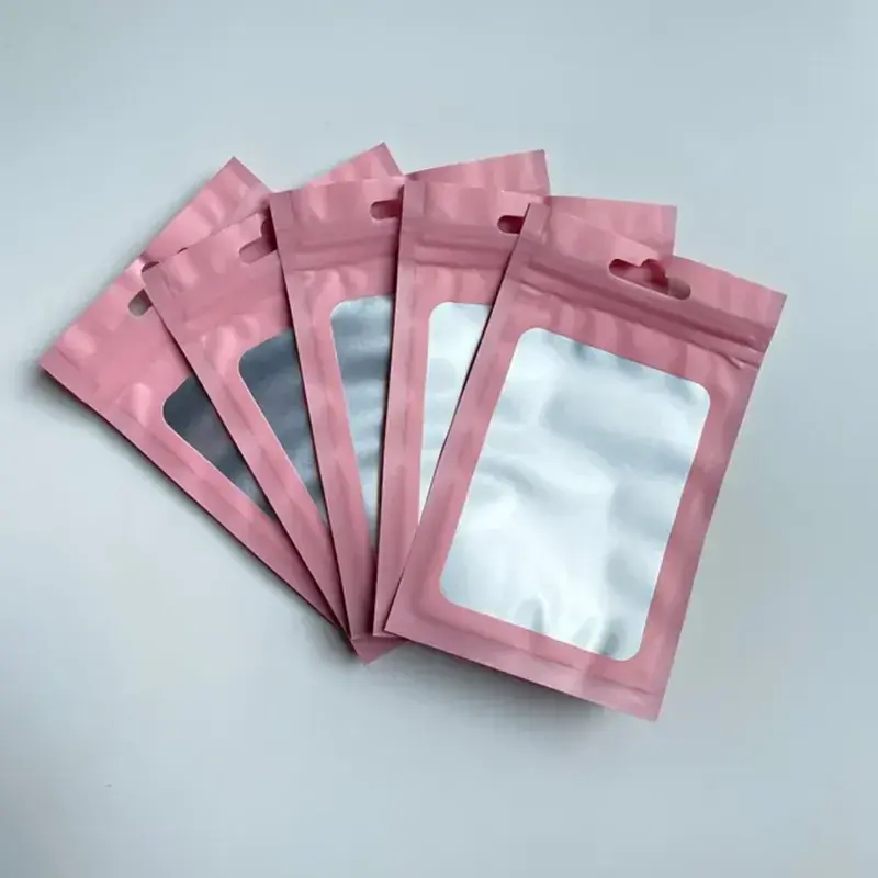 Pink resealable pouches with clear windows arranged in a fan.