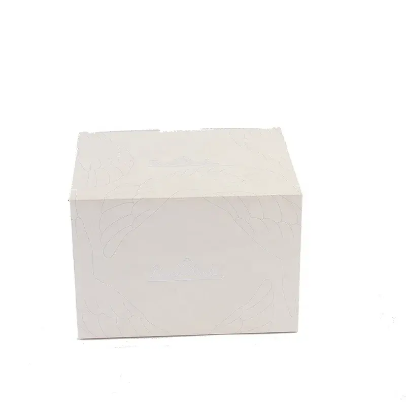 Closed cream box with a lightly textured surface.