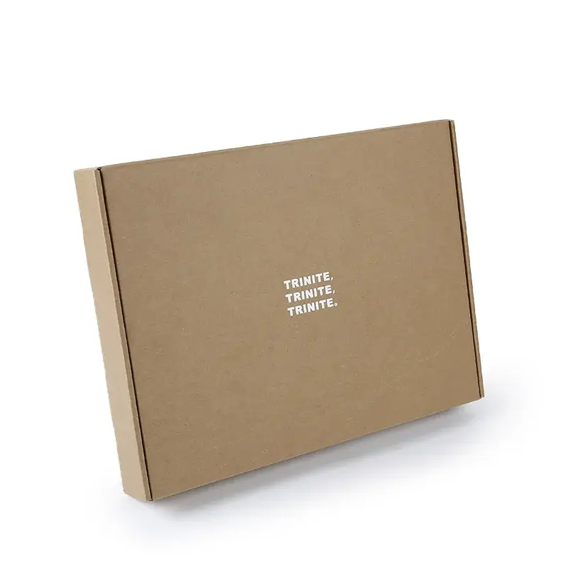Flat kraft mailing box with small white lettering.