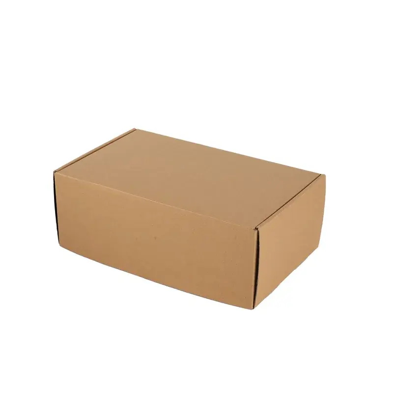 Closed plain kraft mailer box viewed from an angle.