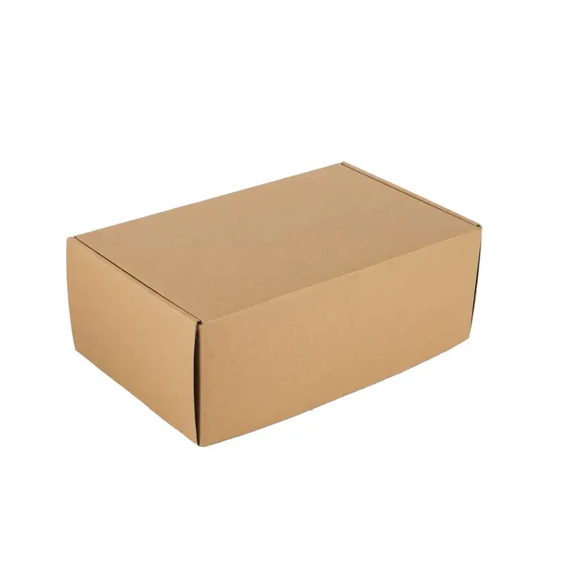 Closed plain kraft mailer box viewed from an angle.