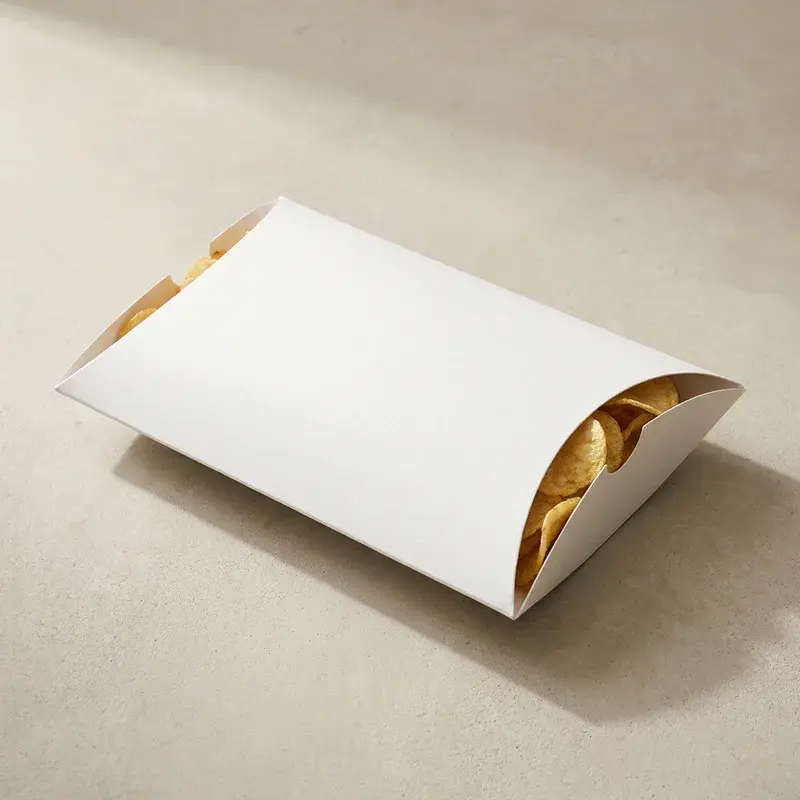 Plain white pillow box with one curved end partly open.