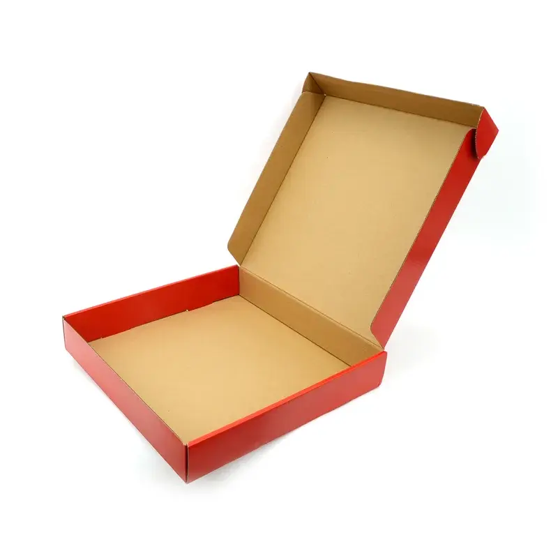 Open red pizza box with a plain brown interior.