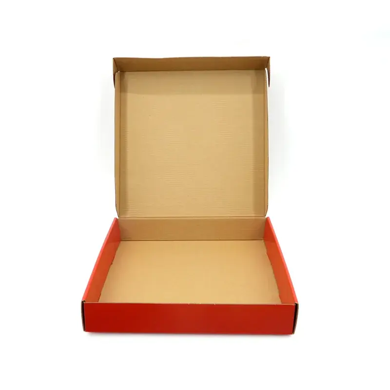 Front view of an open red pizza box with its lid raised.
