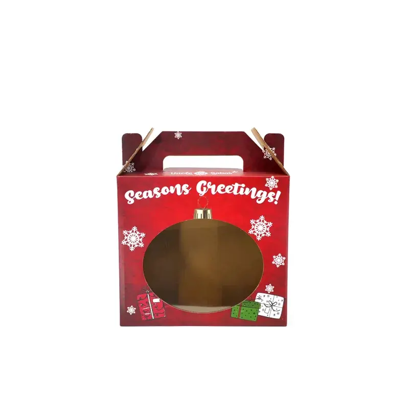Red seasonal gift box with a round window and carry handle.