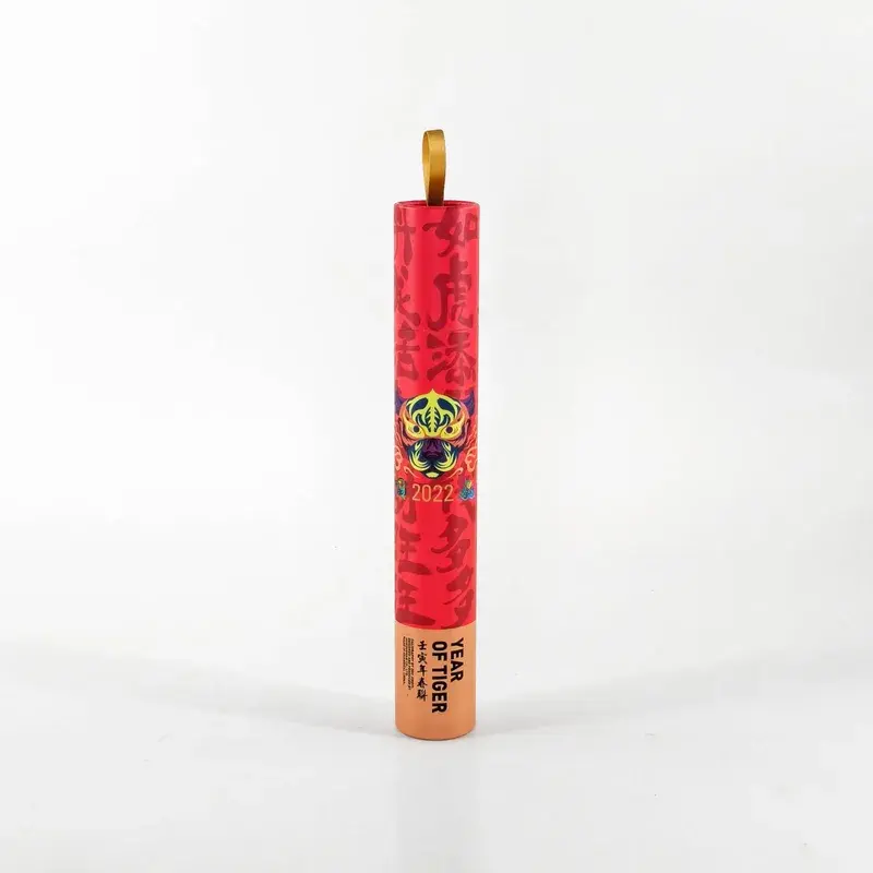 Tall narrow red printed tube with an item extending from the top.