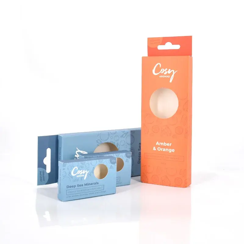 Orange and blue hanging cartons with circular viewing windows.