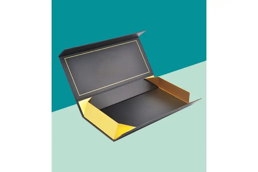 Open yellow gift box with a black interior and hinged lid.