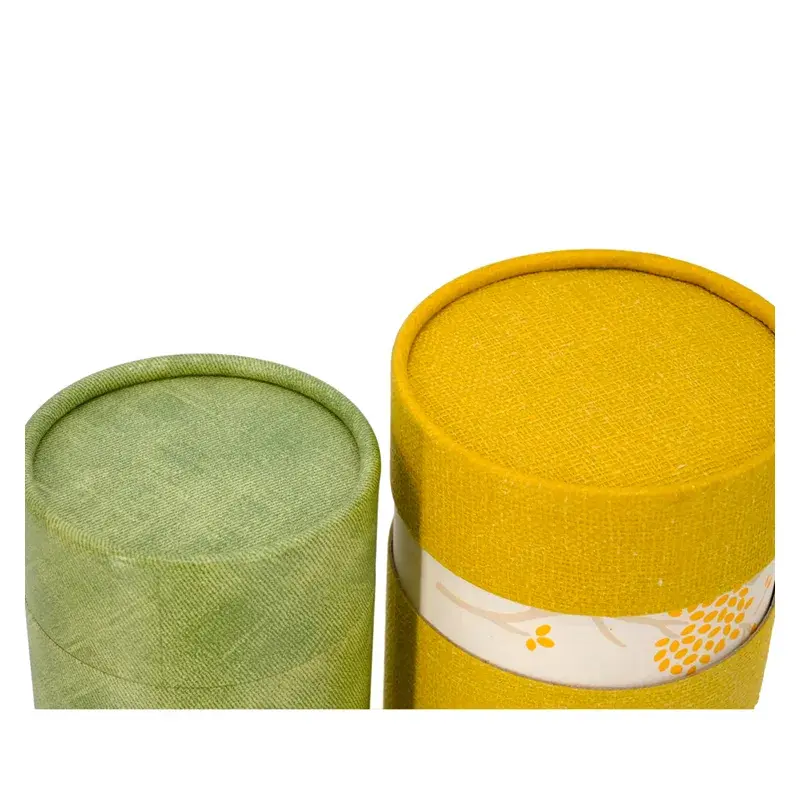 Close view of the round lids on yellow and green containers.
